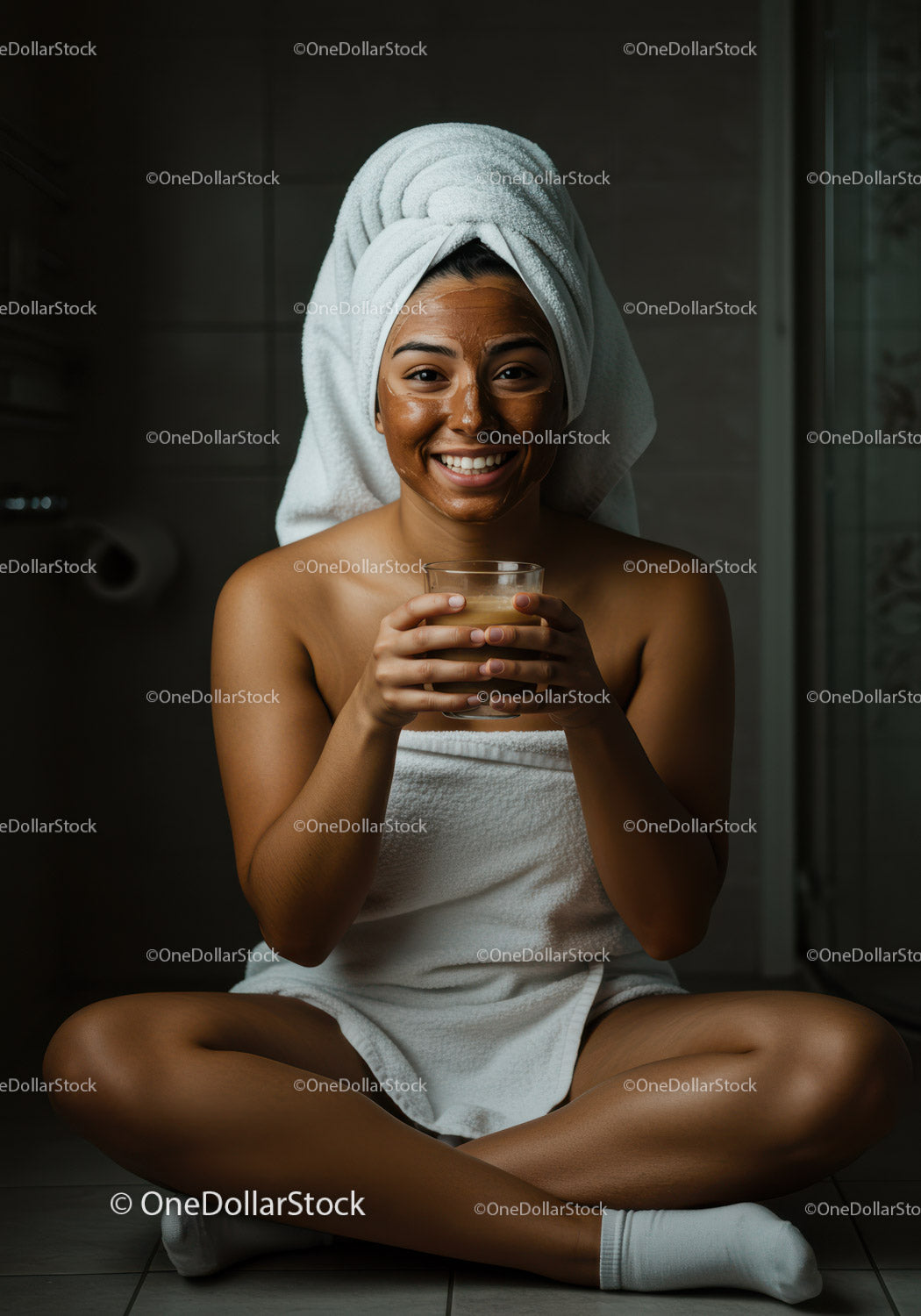 Young Woman in Towel Wrap Enjoying Facial Mask After Spa Treatment
