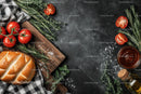 Fresh Cherry Tomatoes and Basil with Bread and Olive Oil on Rustic Board