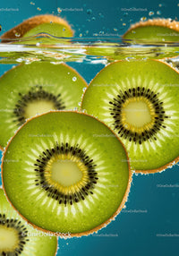 Fresh kiwi slices submerged in sparkling water