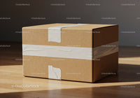 Sealed cardboard box on wooden floor with natural light