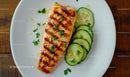 Grilled Salmon with Fresh Cucumber Slices and Herbs