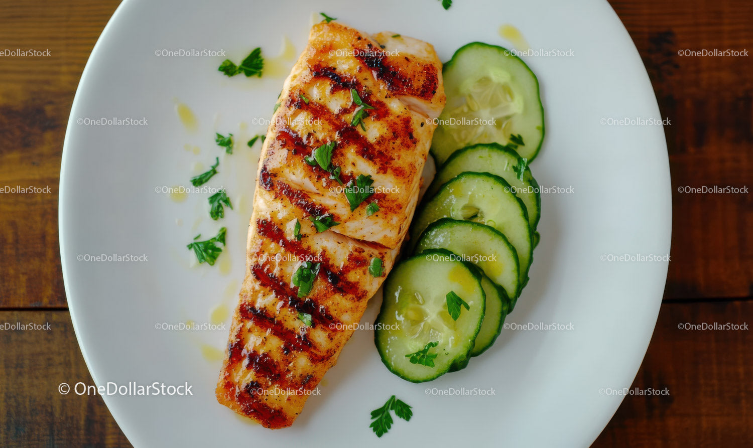Grilled Salmon with Fresh Cucumber Slices and Herbs
