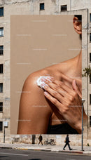 Applying moisturizing cream on shoulder close up