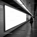 Modern Subway Station with Tiled Walls and Bright Lighting