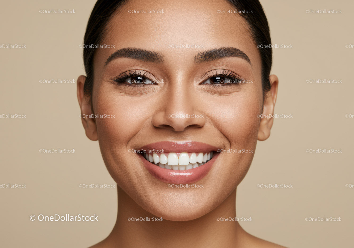 Close up of young woman with perfect smile and clear skin