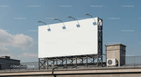 Blank Billboard Mounted on Rooftop Under Clear Sky
