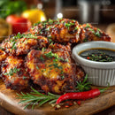 Crispy Fried Chicken Wings with Spicy Dipping Sauce and Fresh Garnishes