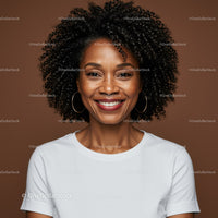 Portrait of a Smiling Woman with Curly Hair and Hoop Earrings