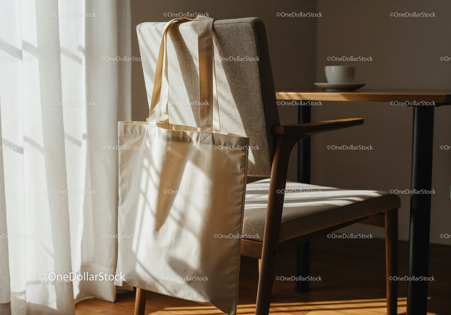 Canvas tote bag hanging on chair in warm sunlight
