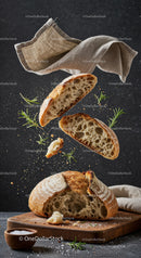 Fresh rustic bread slices levitating with herbs