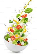 Fresh colorful salad ingredients with olive oil splash