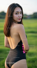 Charming Young Woman Wearing Swimsuit in Green Field During Sunset