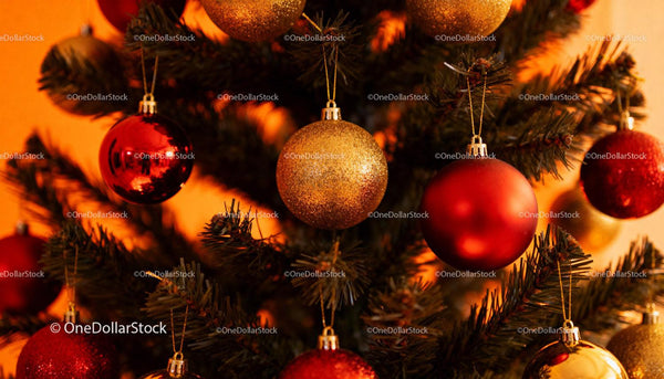 Festive Christmas Tree Decorated with Red and Gold Ornaments