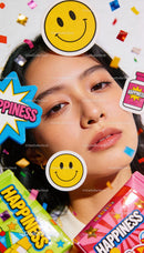 Young woman surrounded by vibrant happiness symbols