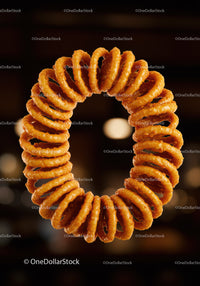 Delicious crispy jalebi sweets arranged in ring shape