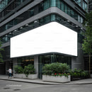 Modern urban building with large blank billboard