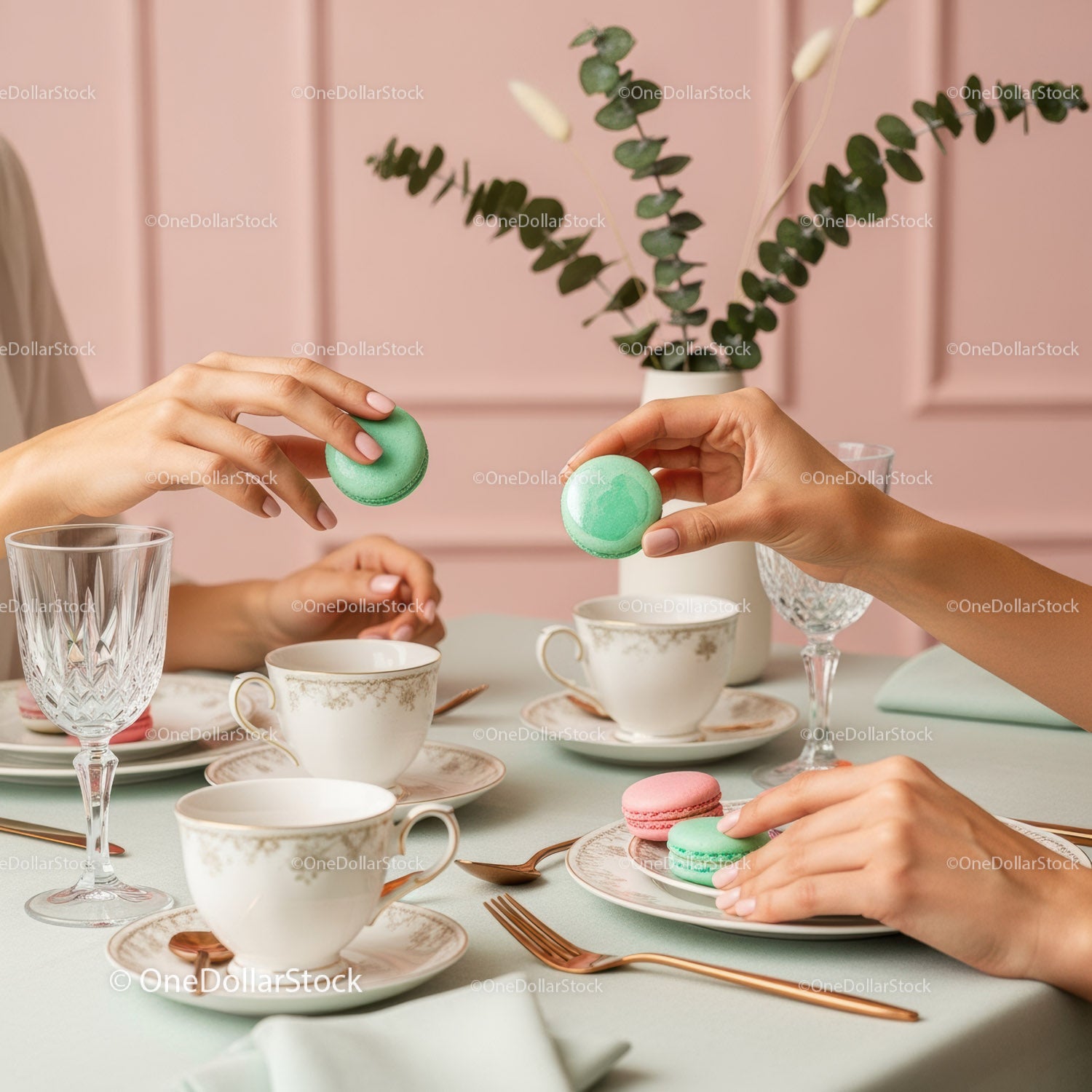 Elegant Tea Party with Macarons and Fine Tableware in Soft Pastel Tones