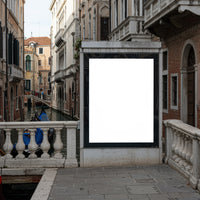 Historic Venetian canal with gondolas and empty billboard