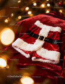 Festive Santa Claus Outfit on Velvet Background