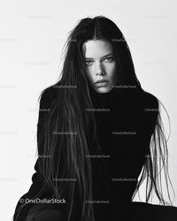 Moody Black and White Portrait of a Woman with Wet Hair and Intense Gaze