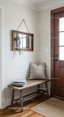 Cozy Entryway with Wooden Bench and Wall Mirror in Warm Home Atmosphere