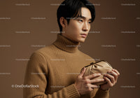 Young Man in Beige Turtleneck Sweater Holding Leather Clutch