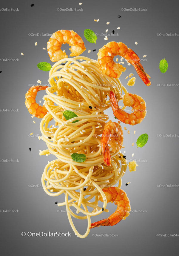 Flying spaghetti with shrimp and fresh herbs