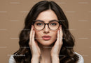 Stylish Woman Wearing Glasses With Brown Hair and Confident Expression