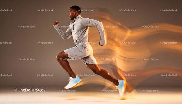 Focused athlete sprinting with dynamic motion blur