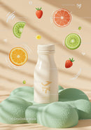 Fresh natural drink surrounded by floating fruit slices