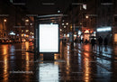 Night Scene of Bus Shelter with Bright Advertising Panel on Wet City Street