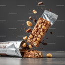 Chocolate Nut Protein Bar Breaking with Nuts and Chunks