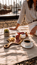 Cozy Urban Picnic with Cheese, Salami, and Coffee
