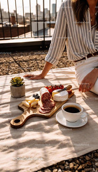 Cozy Urban Picnic with Cheese, Salami, and Coffee