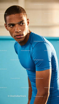 Focused young athlete preparing for training session