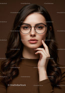 Elegant Young Woman Wearing Glasses with Brunette Hair in Studio Portrait