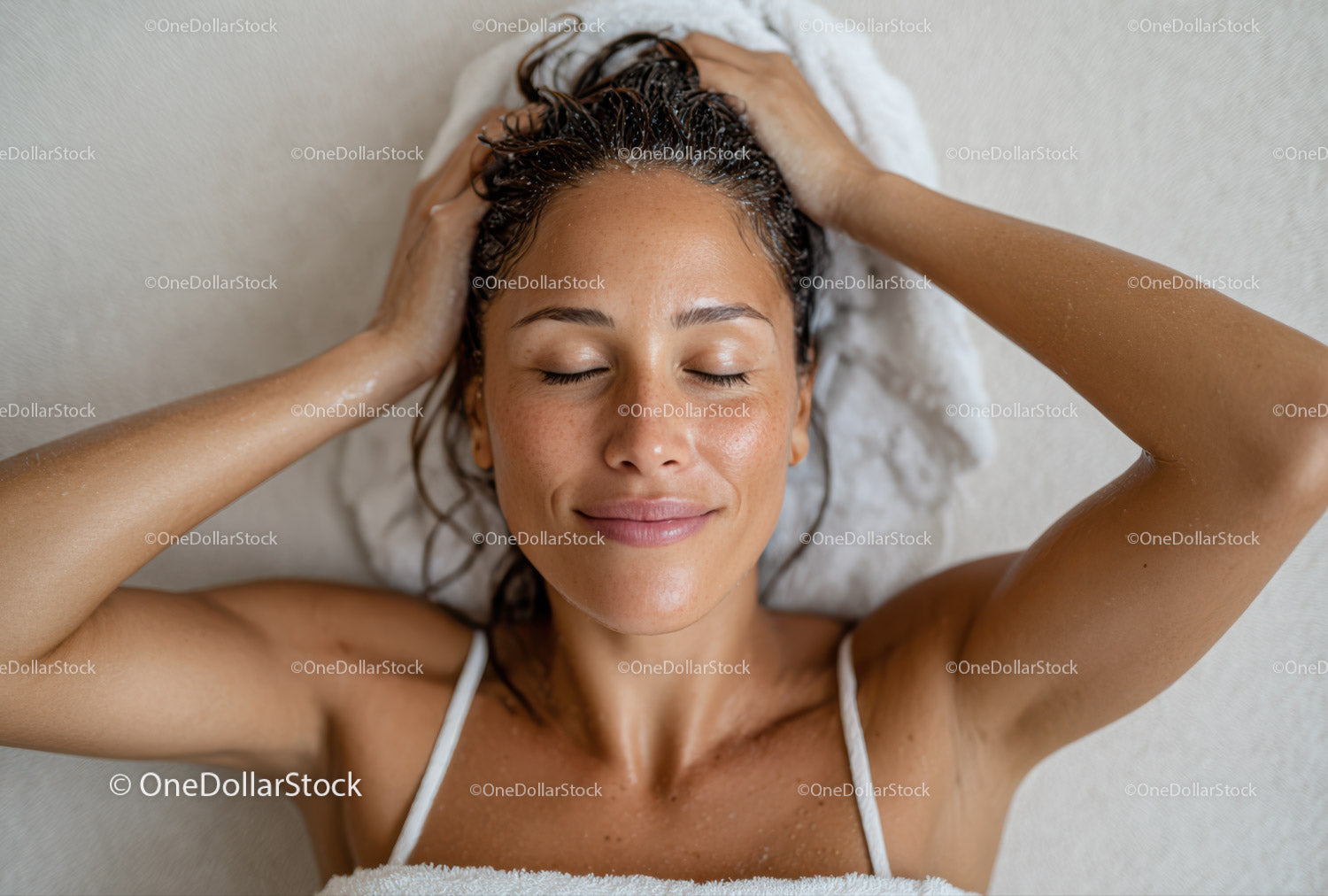 Relaxing Woman Receiving Head Massage in Spa Setting