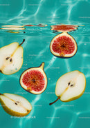 Fresh pear and fig slices floating in turquoise water