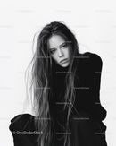 Moody Black and White Portrait of a Woman with Long Hair