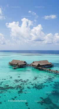 Tropical Overwater Bungalows with Clear Turquoise Water and Blue Sky