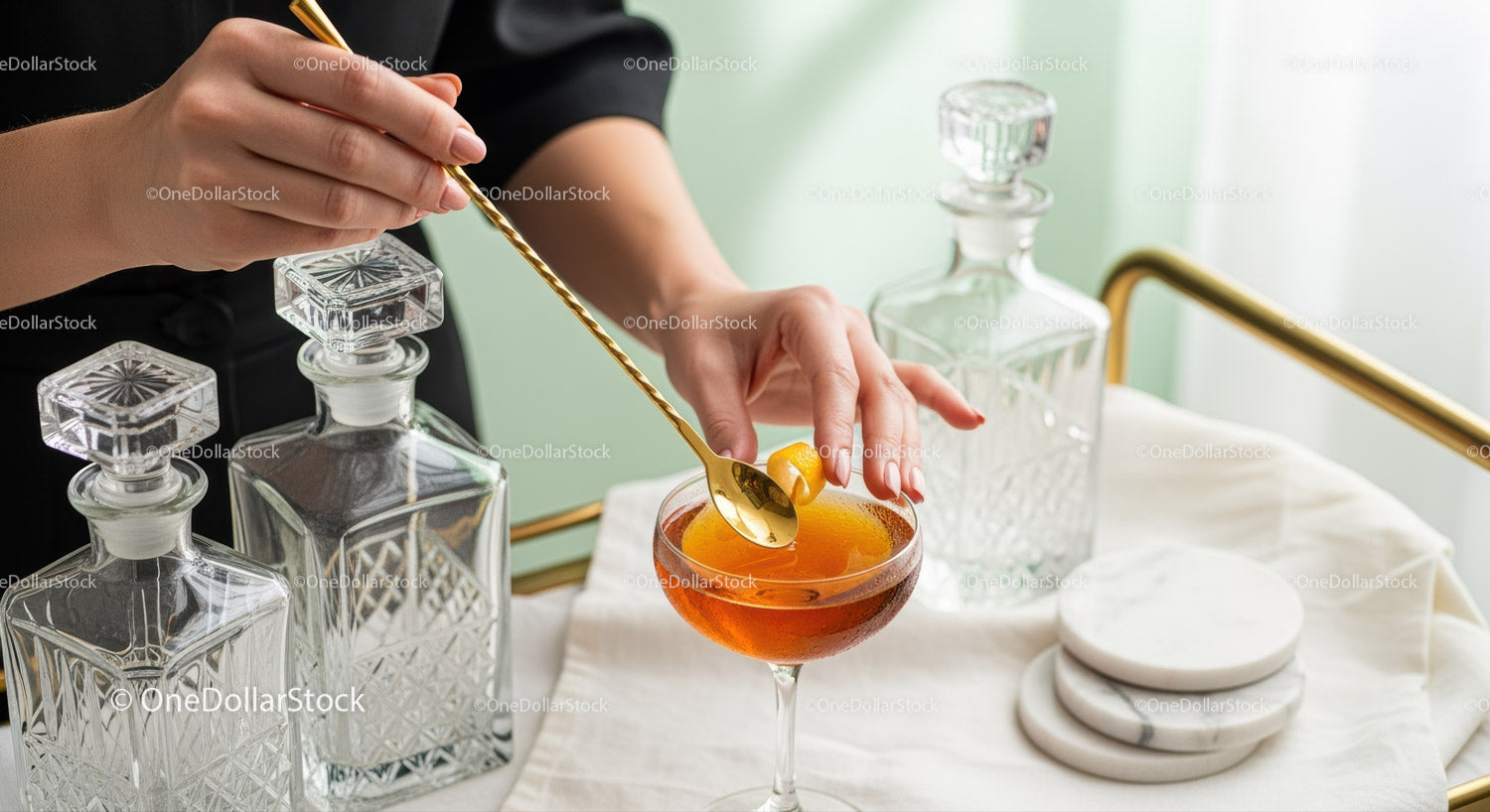 Elegant Amber Cocktail with Crystal Decanters and Gold Spoon