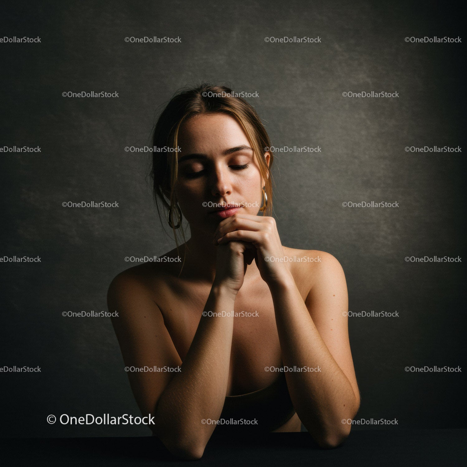 Serene Woman with Freckles and Closed Eyes in Studio Portrait