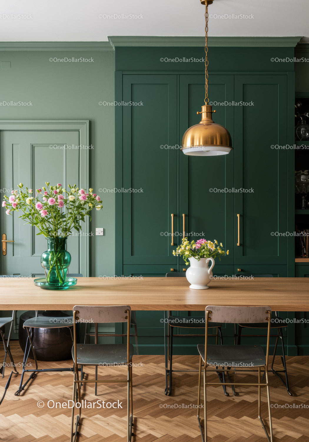 Stylish Kitchen with Green Cabinets and Elegant Floral Arrangements