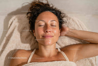 Relaxing Woman with Clear Skin During Spa Treatment
