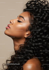 Profile of calm woman with voluminous curly hair